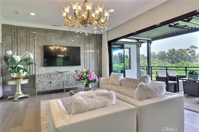 182 Denslow Ave, Los Angeles, CA 90049 - living area with healthy amount of natural light, a chandelier, crown molding, wood finished floors, and recessed lighting