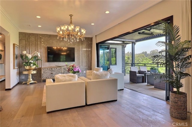 182 Denslow Ave, Los Angeles, CA 90049 - living room with crown molding, hardwood / wood-style flooring, a chandelier, and recessed lighting