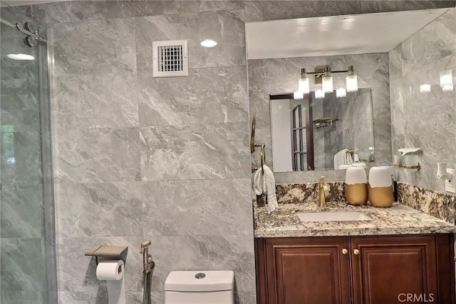 182 Denslow Ave, Los Angeles, CA 90049 - bathroom featuring tile walls, vanity, and walk in shower
