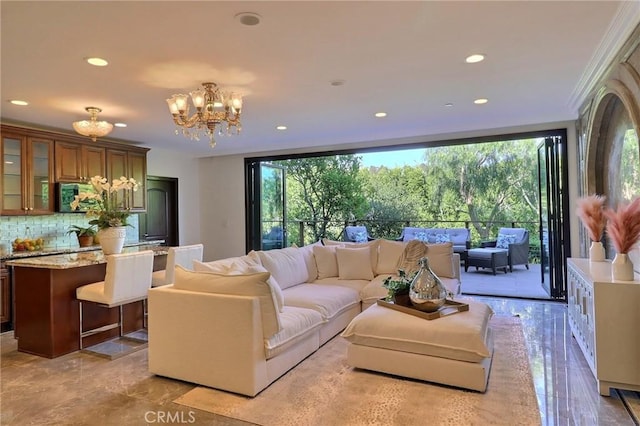 182 Denslow Ave, Los Angeles, CA 90049 - living area featuring plenty of natural light, a chandelier, and recessed lighting
