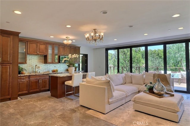 182 Denslow Ave, Los Angeles, CA 90049 - living room with plenty of natural light, a chandelier, and recessed lighting
