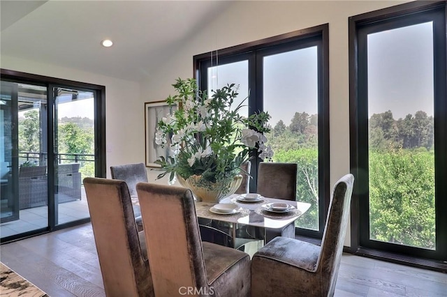 182 Denslow Ave, Los Angeles, CA 90049 - dining space with vaulted ceiling, french doors, recessed lighting, and wood finished floors