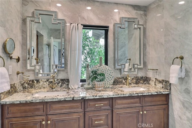 182 Denslow Ave, Los Angeles, CA 90049 - bathroom with double vanity and tile walls