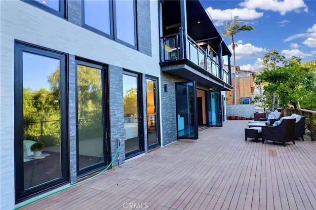 182 Denslow Ave, Los Angeles, CA 90049 - deck with an outdoor living space