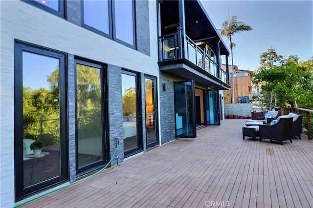 182 Denslow Ave, Los Angeles, CA 90049 - deck featuring an outdoor living space