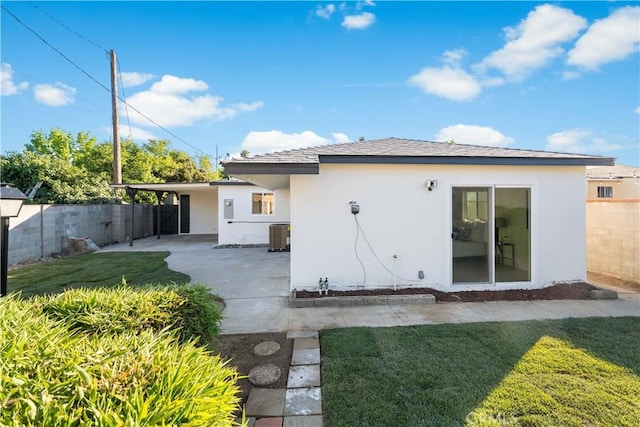 611 Griffith St, San Fernando, CA 91340 - rear view of house with stucco siding and a patio area