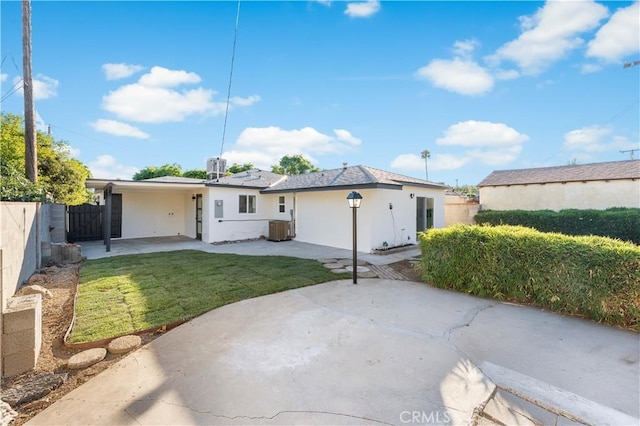 611 Griffith St, San Fernando, CA 91340 - rear view of property with a patio and stucco siding