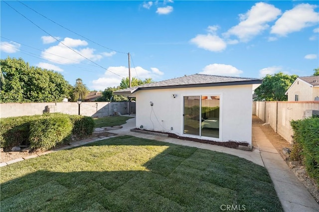 611 Griffith St, San Fernando, CA 91340 - back of house with stucco siding and a fenced backyard