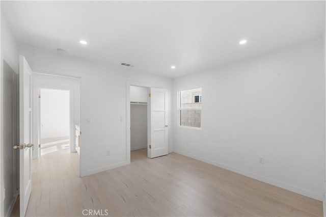 611 Griffith St, San Fernando, CA 91340 - unfurnished bedroom featuring light wood-style floors and recessed lighting