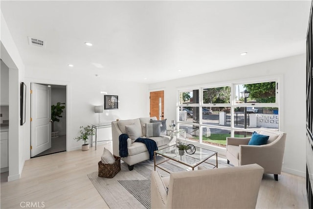 611 Griffith St, San Fernando, CA 91340 - living area featuring light wood-type flooring and recessed lighting
