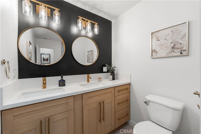 611 Griffith St, San Fernando, CA 91340 - bathroom with double vanity and toilet