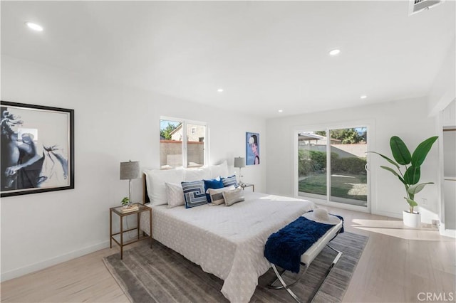 611 Griffith St, San Fernando, CA 91340 - bedroom featuring access to outside, wood finished floors, and recessed lighting