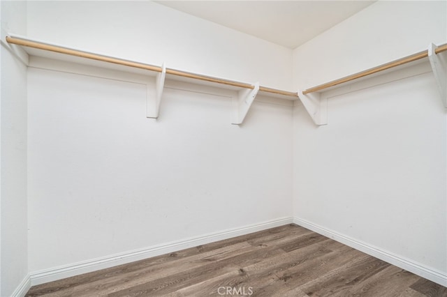 26649 Azalea St, Moreno Valley, CA 92555 - spacious closet featuring wood finished floors