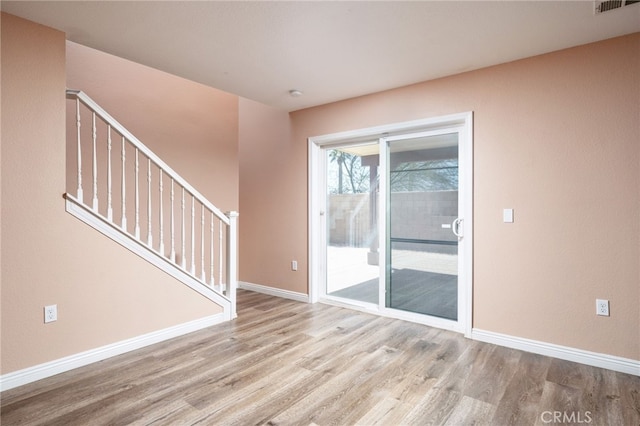 26649 Azalea St, Moreno Valley, CA 92555 - spare room featuring wood finished floors and baseboards