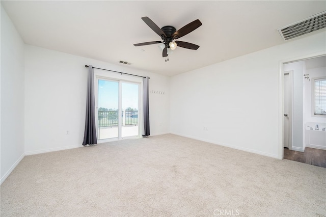 26649 Azalea St, Moreno Valley, CA 92555 - carpeted spare room featuring baseboards and a ceiling fan