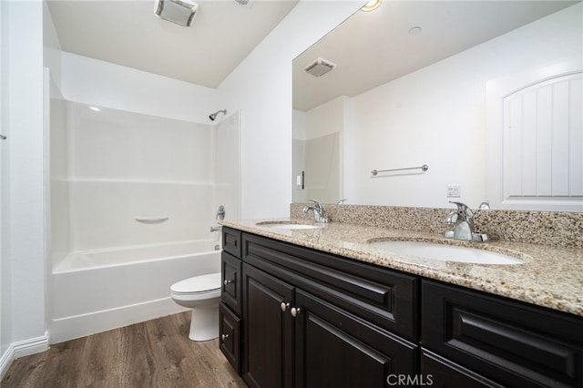 26649 Azalea St, Moreno Valley, CA 92555 - full bathroom with wood finished floors, double vanity, and shower / bath combination