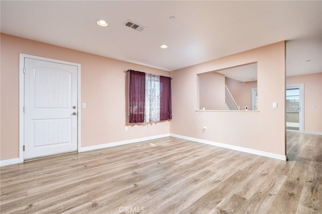 26649 Azalea St, Moreno Valley, CA 92555 - spare room featuring light wood-style flooring, recessed lighting, and stairway