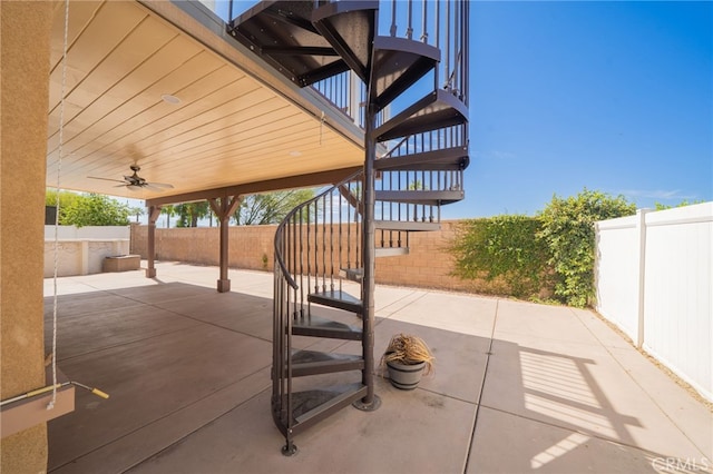 26649 Azalea St, Moreno Valley, CA 92555 - fenced backyard with stairs, a patio area, and a ceiling fan