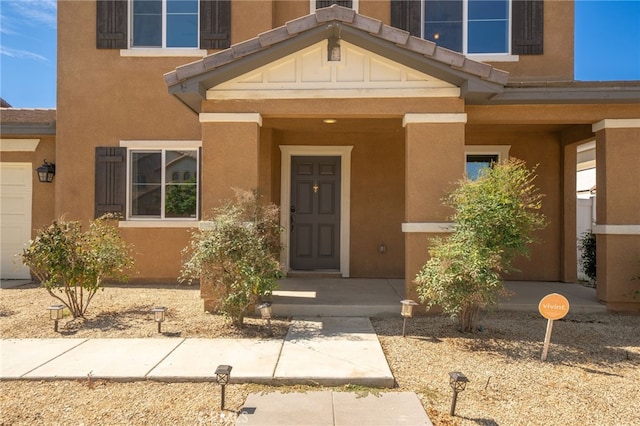 26649 Azalea St, Moreno Valley, CA 92555 - doorway to property featuring stucco siding