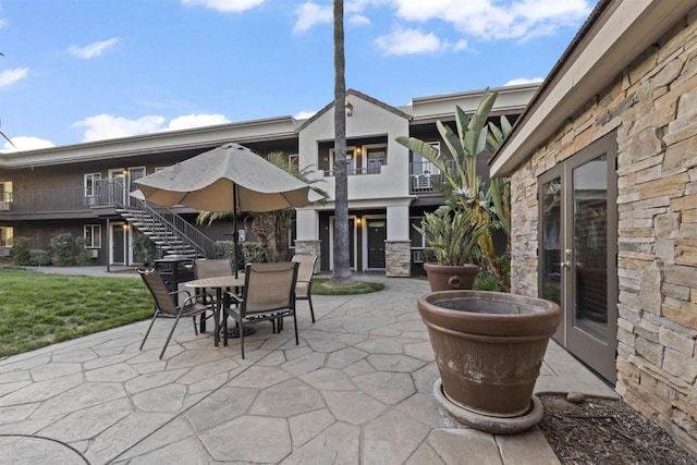 800 N Mollison Ave Unit 56, El Cajon, CA 92021 - view of patio / terrace featuring stairway and outdoor dining space