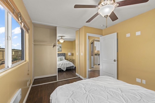 800 N Mollison Ave Unit 56, El Cajon, CA 92021 - bedroom featuring wood finished floors, arched walkways, ceiling fan, and a closet
