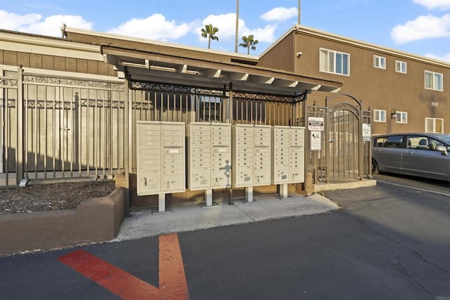 800 N Mollison Ave Unit 56, El Cajon, CA 92021 - view of home's community featuring mail area and a parking lot
