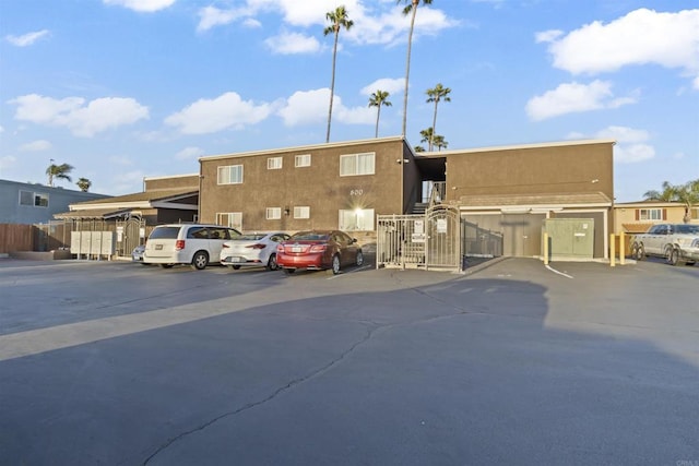 800 N Mollison Ave Unit 56, El Cajon, CA 92021 - view of front facade with stucco siding and uncovered parking