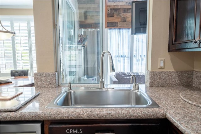 39560 Tinderbox Way, Murrieta, CA 92562 - kitchen with dark brown cabinets and light countertops