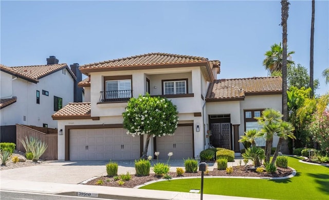 39560 Tinderbox Way, Murrieta, CA 92562 - mediterranean / spanish-style house with a tiled roof, driveway, and stucco siding
