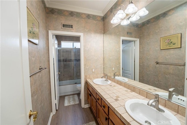 39560 Tinderbox Way, Murrieta, CA 92562 - full bath featuring double vanity, crown molding, wood finished floors, a chandelier, and  shower combination
