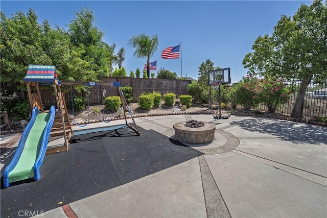 39560 Tinderbox Way, Murrieta, CA 92562 - view of patio / terrace with a playground and an outdoor fire pit