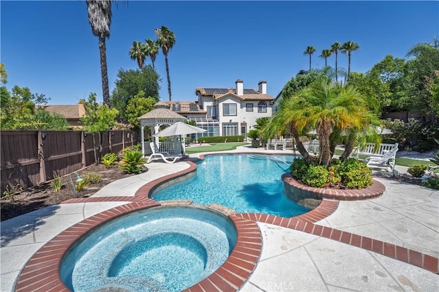 39560 Tinderbox Way, Murrieta, CA 92562 - view of pool with a gazebo, a pool with connected hot tub, and a patio