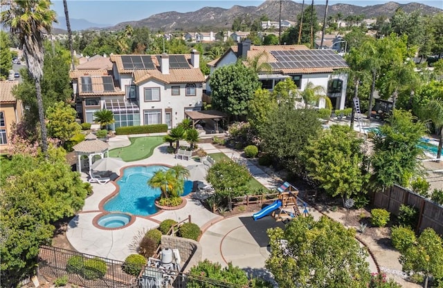 39560 Tinderbox Way, Murrieta, CA 92562 - aerial view of a pool area and a mountainous background