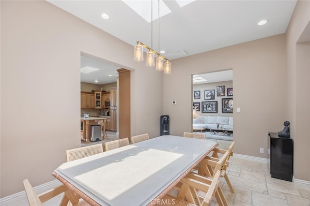 8817 Encino Ave, Sherwood Forest, CA 91325 - dining space featuring recessed lighting and stone tile flooring