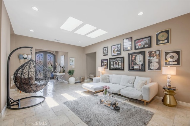 8817 Encino Ave, Sherwood Forest, CA 91325 - living room featuring stone tile flooring and recessed lighting