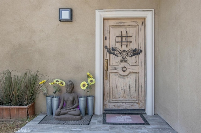 8817 Encino Ave, Sherwood Forest, CA 91325 - property entrance with stucco siding