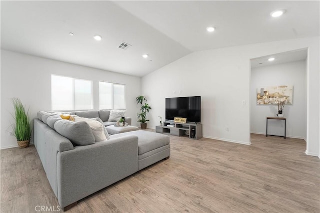 10335 Saint Andrews Ct, Adelanto, CA 92301 - living area with vaulted ceiling, light wood-type flooring, and recessed lighting