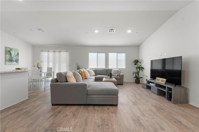 10335 Saint Andrews Ct, Adelanto, CA 92301 - living area featuring wood finished floors and recessed lighting