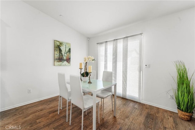 10335 Saint Andrews Ct, Adelanto, CA 92301 - dining area featuring wood finished floors and lofted ceiling