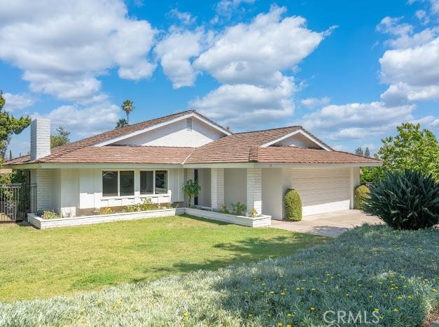 1050 Loma Verde Dr, Arcadia, CA 91006 - ranch-style house featuring a garage, a front lawn, a chimney, and driveway