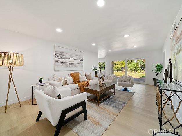 1050 Loma Verde Dr, Arcadia, CA 91006 - living room with light wood-type flooring and recessed lighting
