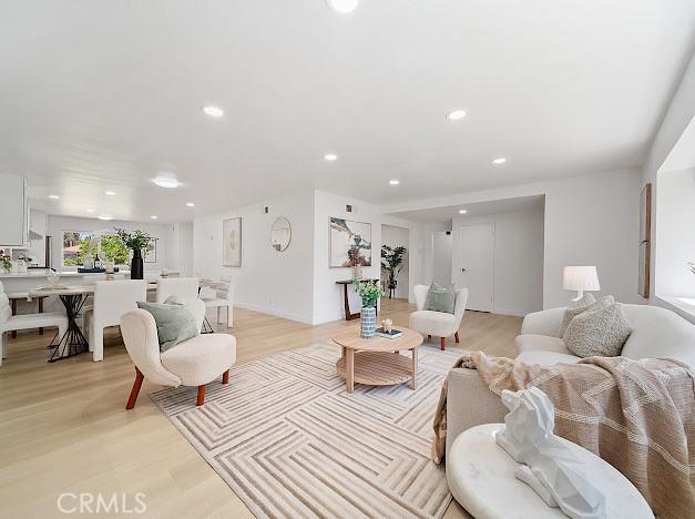 1050 Loma Verde Dr, Arcadia, CA 91006 - living room featuring light wood-style flooring and recessed lighting