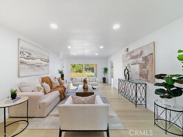 1050 Loma Verde Dr, Arcadia, CA 91006 - living room featuring recessed lighting and light wood-type flooring