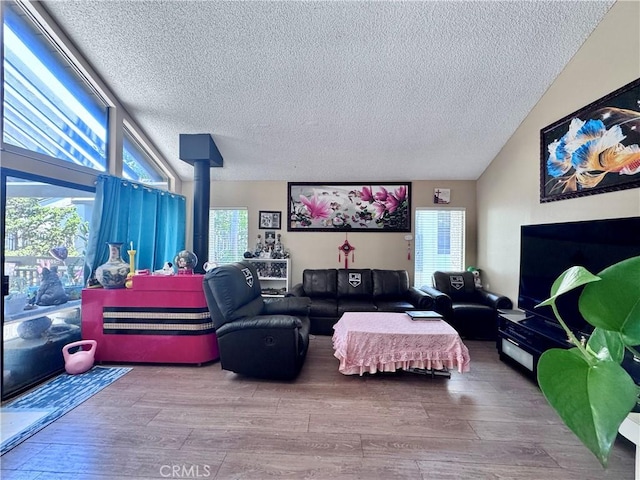 2532 W Macarthur Blvd Unit B, Santa Ana, CA 92704 - living room featuring a textured ceiling and wood finished floors