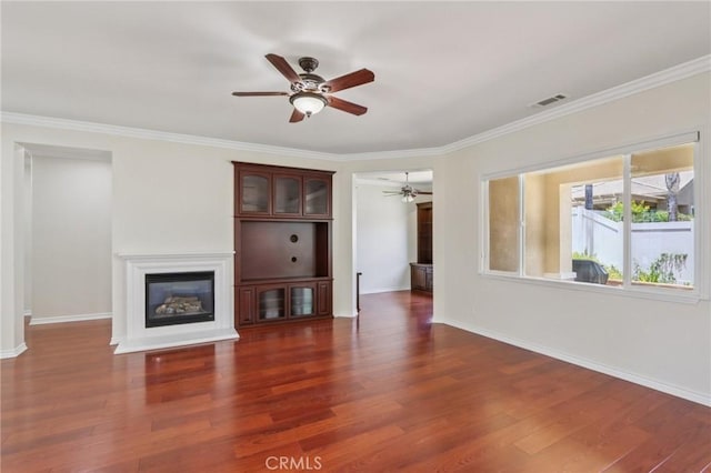 5136 Via Bajamar, Hemet, CA 92545 - unfurnished living room with a ceiling fan, a glass covered fireplace, wood finished floors, and crown molding