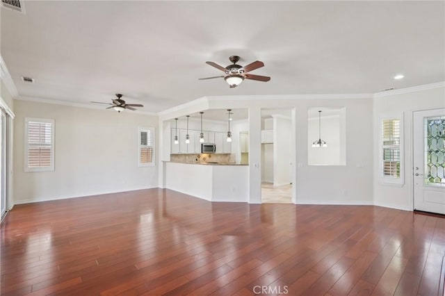 5136 Via Bajamar, Hemet, CA 92545 - unfurnished living room with a ceiling fan, ornamental molding, wood finished floors, and recessed lighting