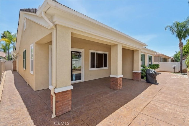 5136 Via Bajamar, Hemet, CA 92545 - back of house with a patio, stucco siding, and a fenced backyard