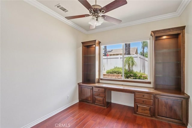 5136 Via Bajamar, Hemet, CA 92545 - unfurnished office with built in study area, dark wood-style floors, ornamental molding, and a ceiling fan