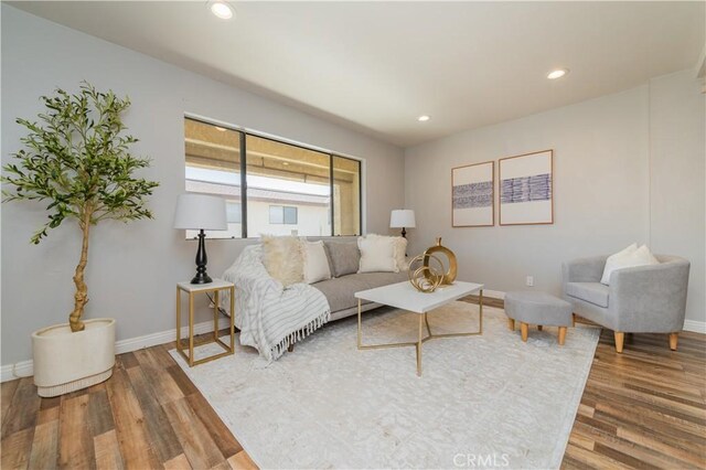 1223 S Golden W Ave Unit F, Arcadia, CA 91007 - living room with wood finished floors and recessed lighting