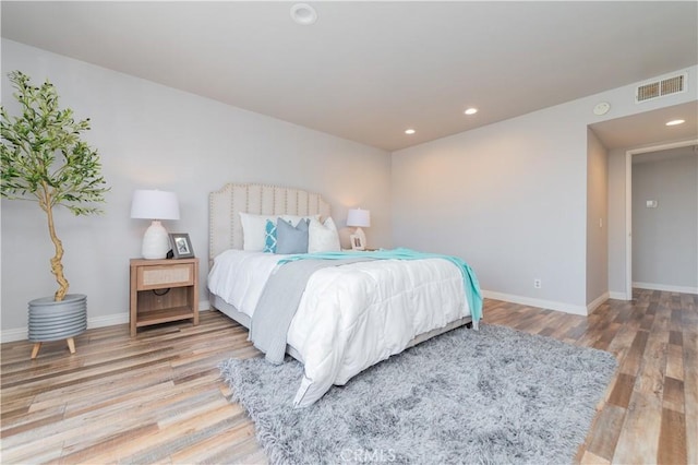 1223 S Golden W Ave Unit F, Arcadia, CA 91007 - bedroom with light wood-style floors and recessed lighting